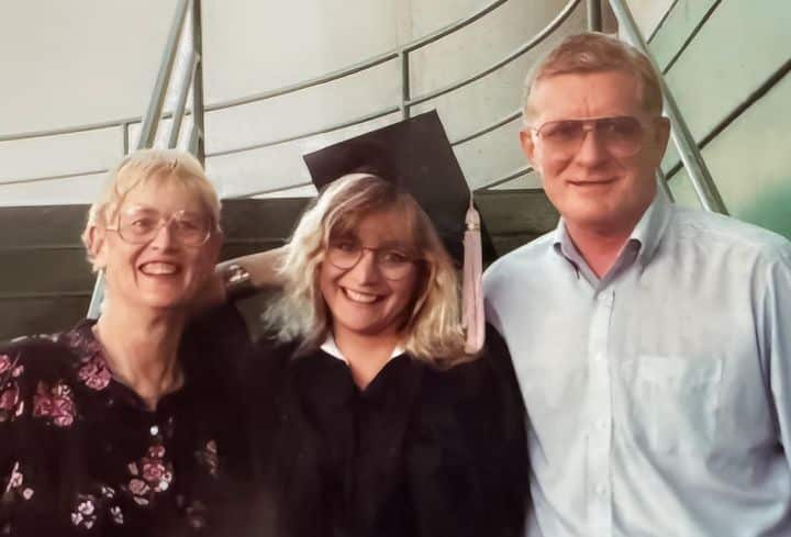 The author with her parents at her college graduation.
